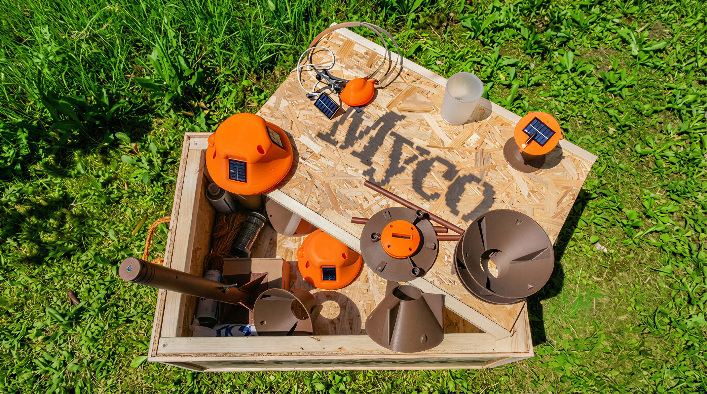 Anders brand wordmark in white placed on top of an image of a modern interior design.