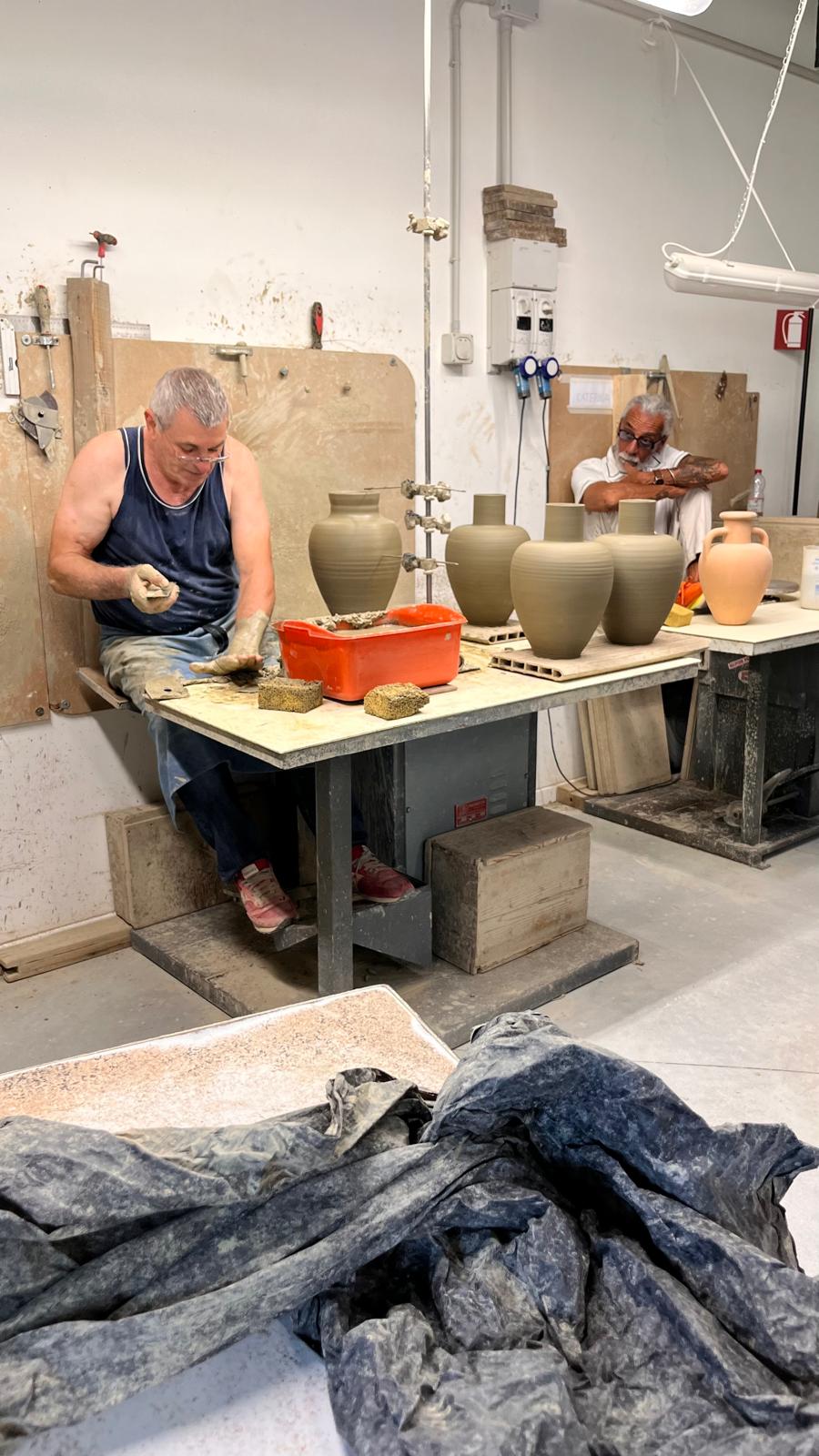 Stationery design of letterhead and business cards for the company Anders on top of a blurred photo of a house interior.