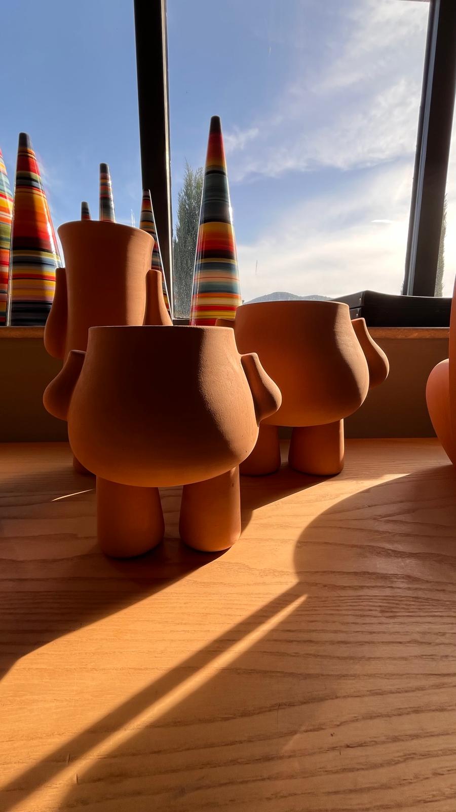 Graphic depicting a hexagonal cropped photo of an interior room design with grid lines along its borders.