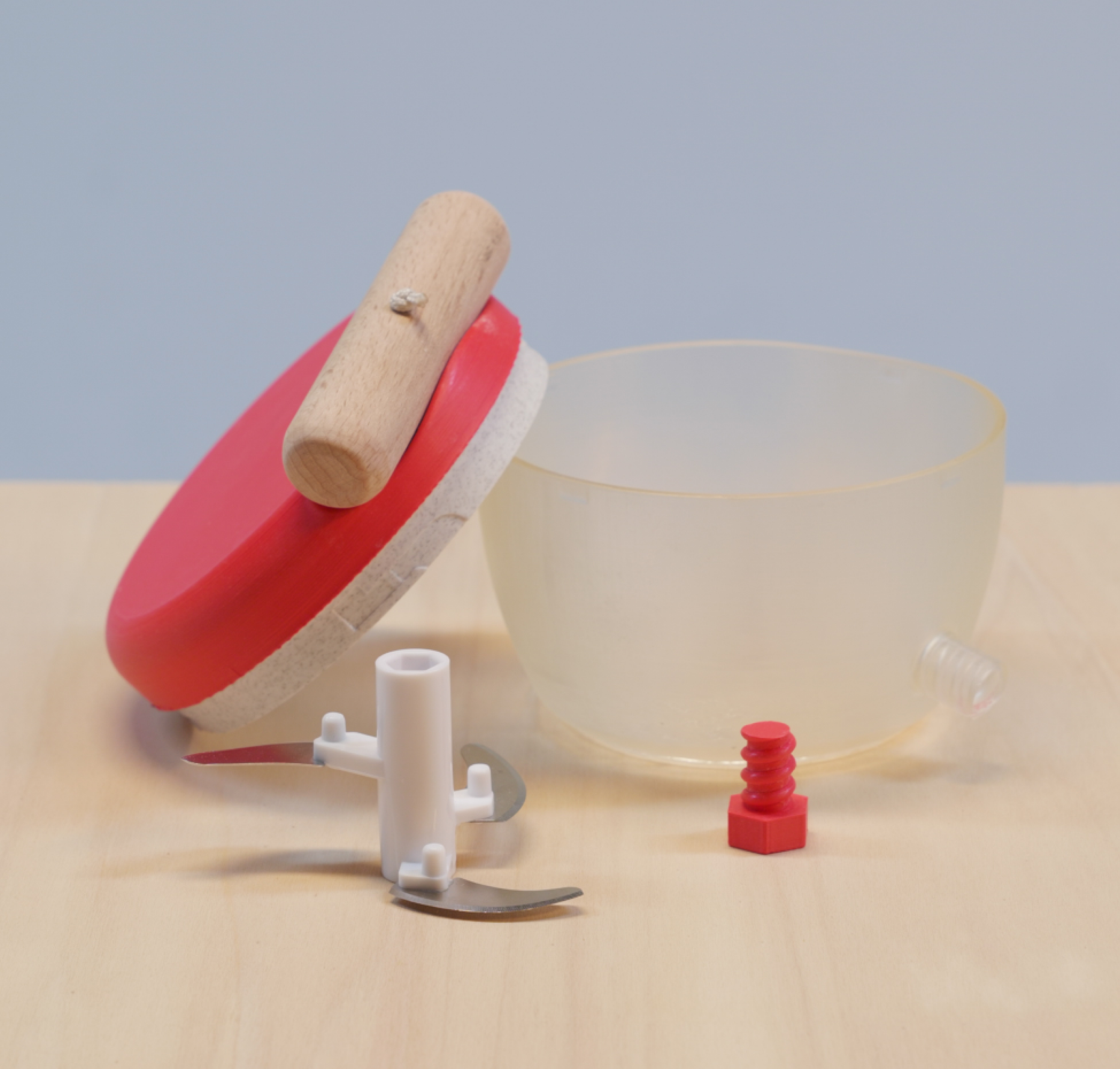 Graphic of a typography specimen showing the alphabet and numerals on top of a dark gray background.