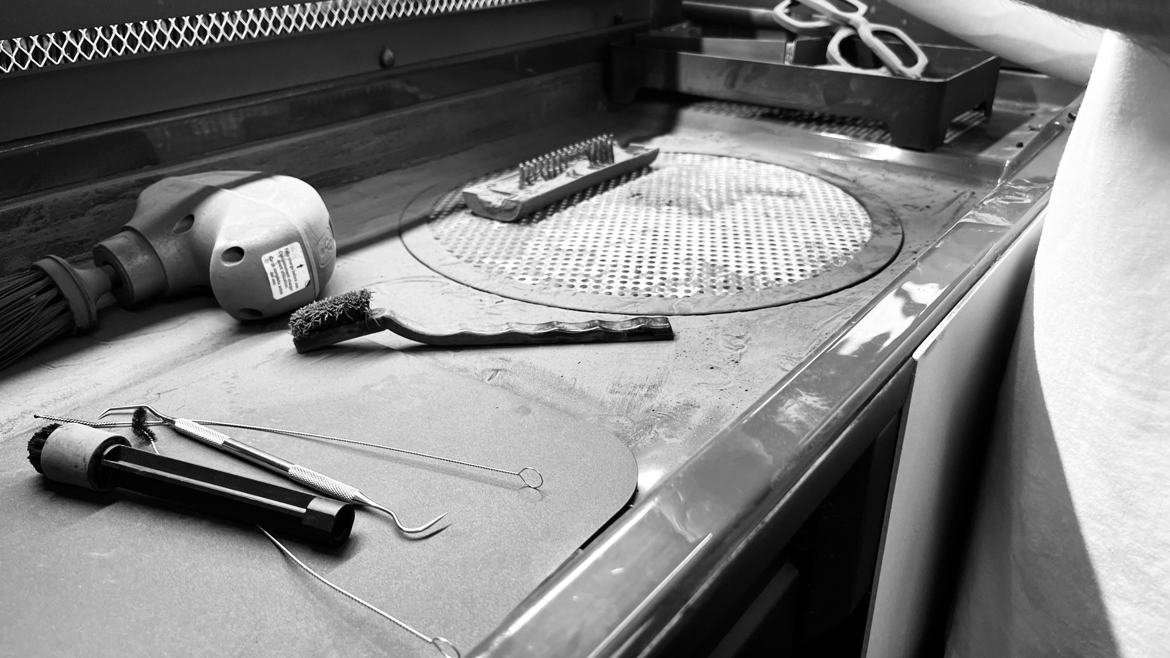 Stationery design of letterhead and business cards for the company Anders on top of a blurred photo of a house interior.